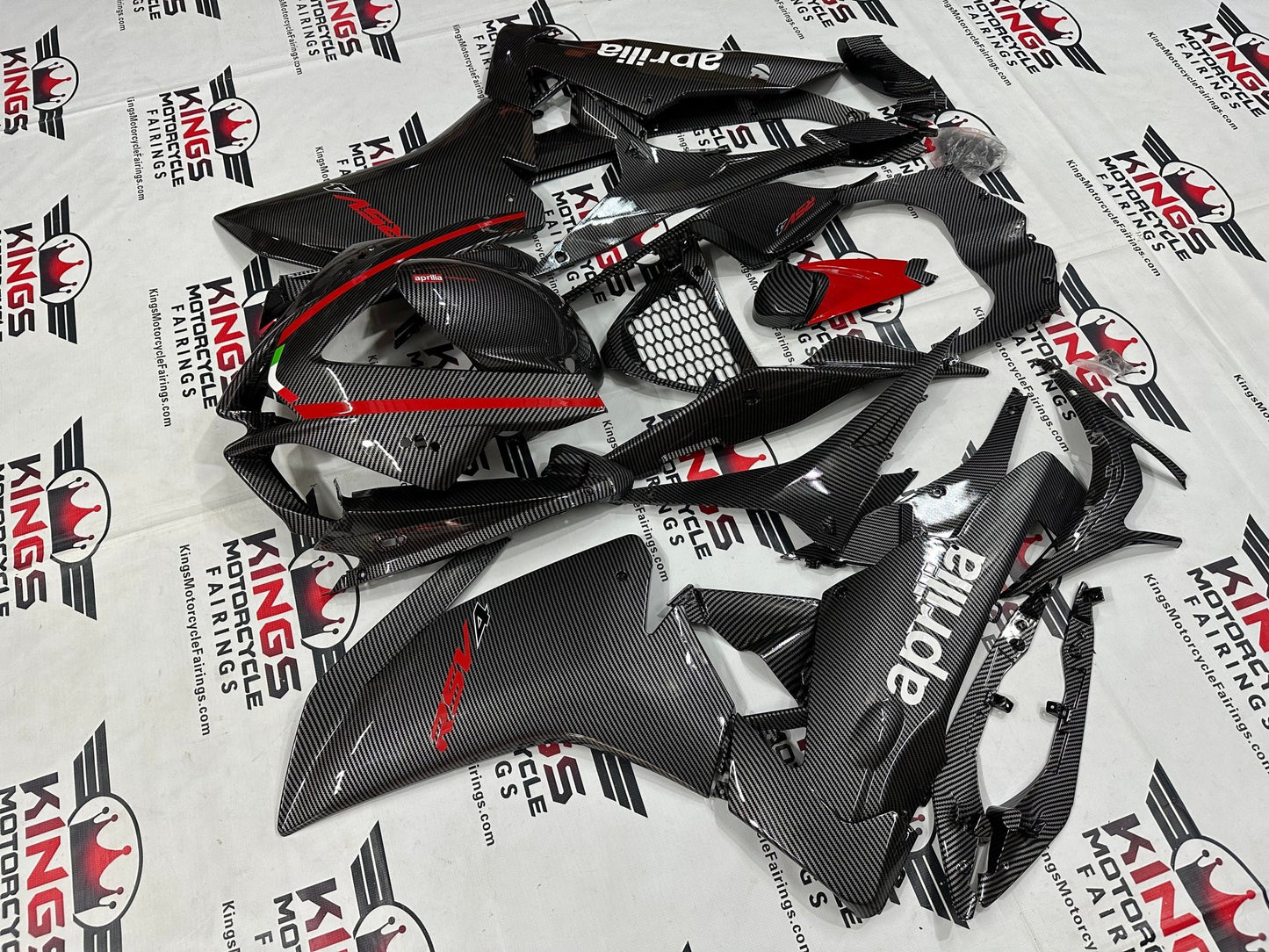 Aprilia RSV4 1000 Fairing Kit (2009-2015) Faux Carbon Fiber, Red at KingsMotorcycleFairings.com