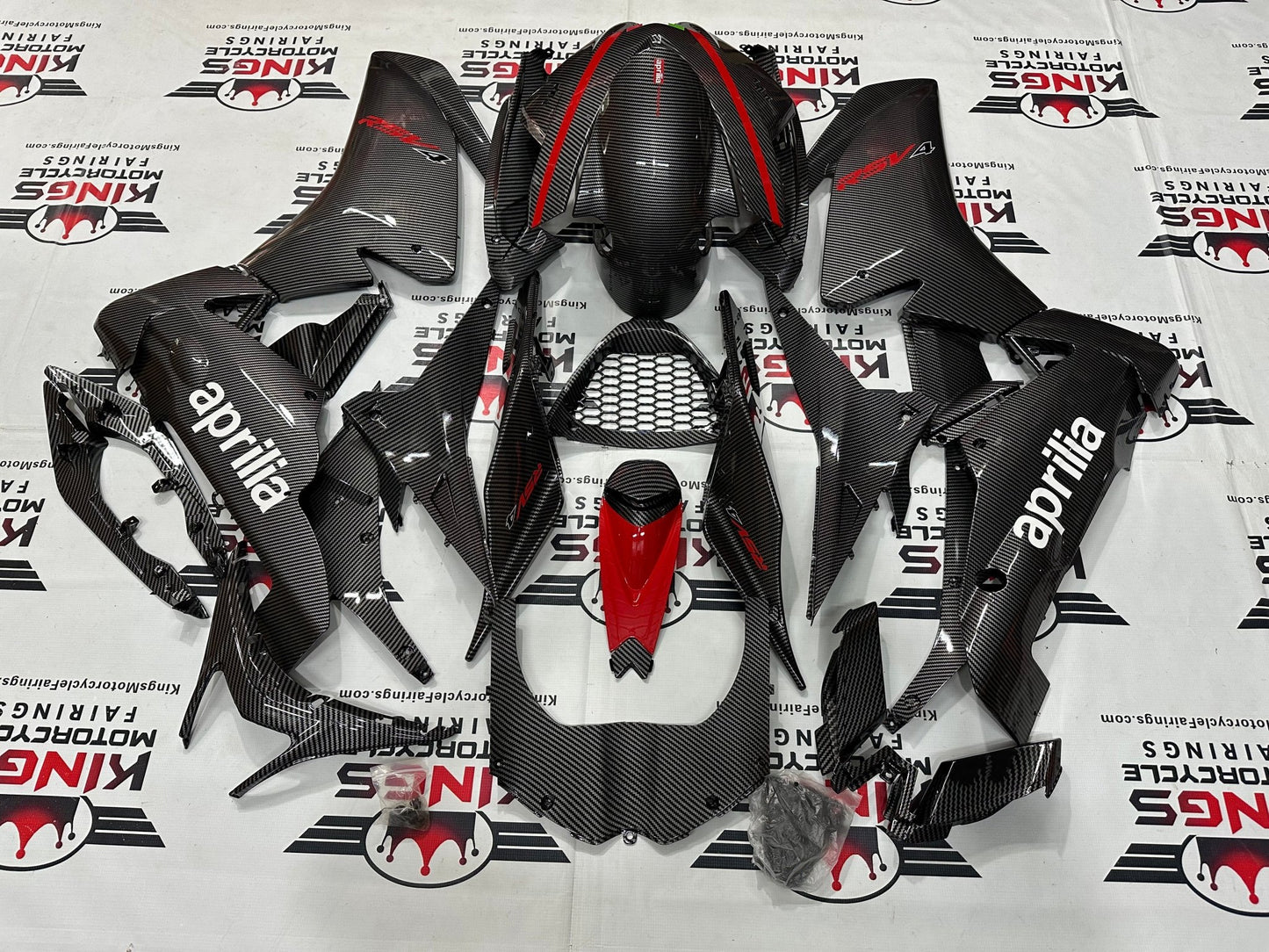 Aprilia RSV4 1000 Fairing Set (2009-2015) Faux Carbon Fiber, Red at KingsMotorcycleFairings.com