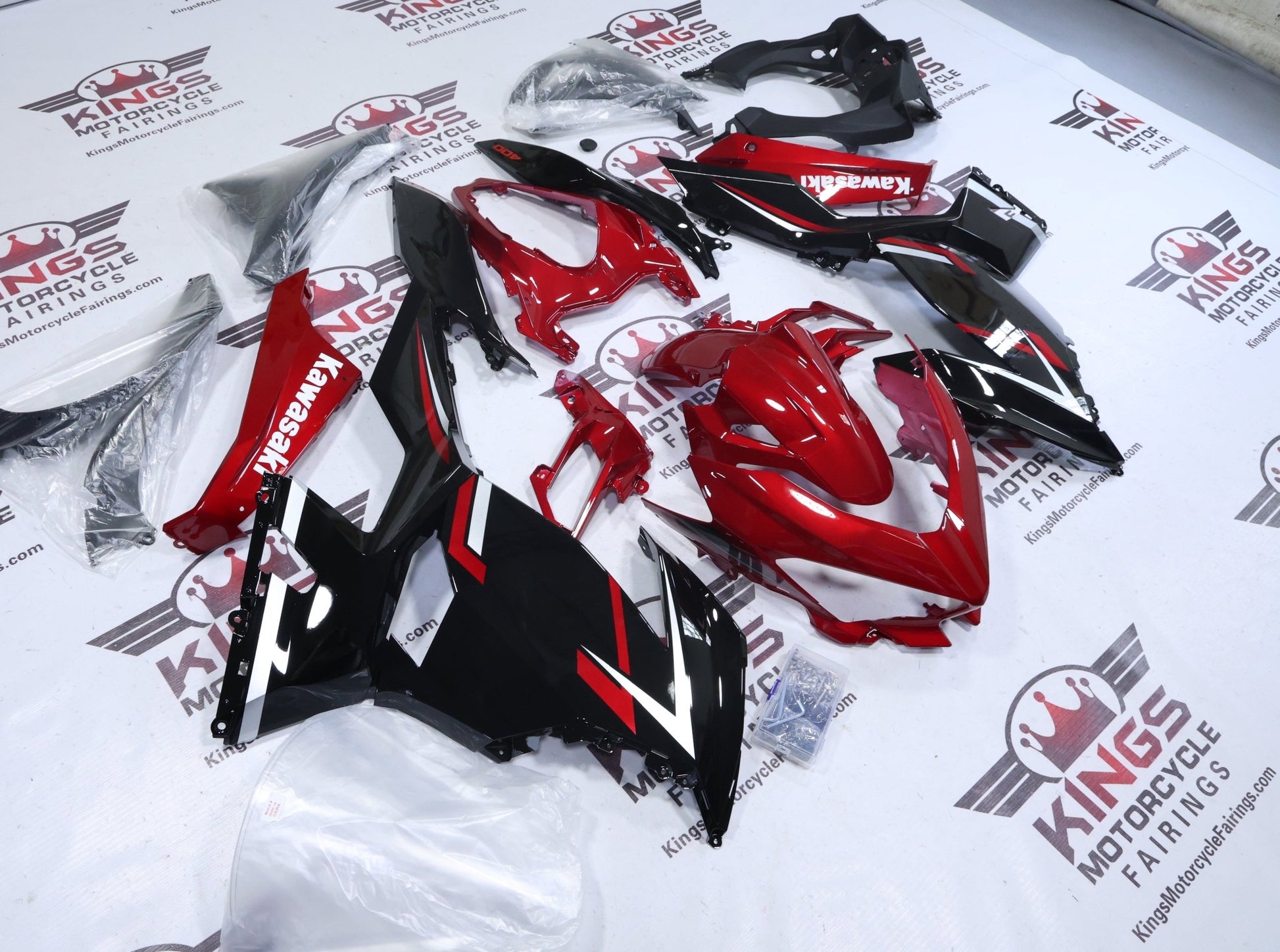 Fairings for Kawasaki Ninja 400 (2018-2023) Candy Red, Black, White from KingsMotorcycleFairings.com