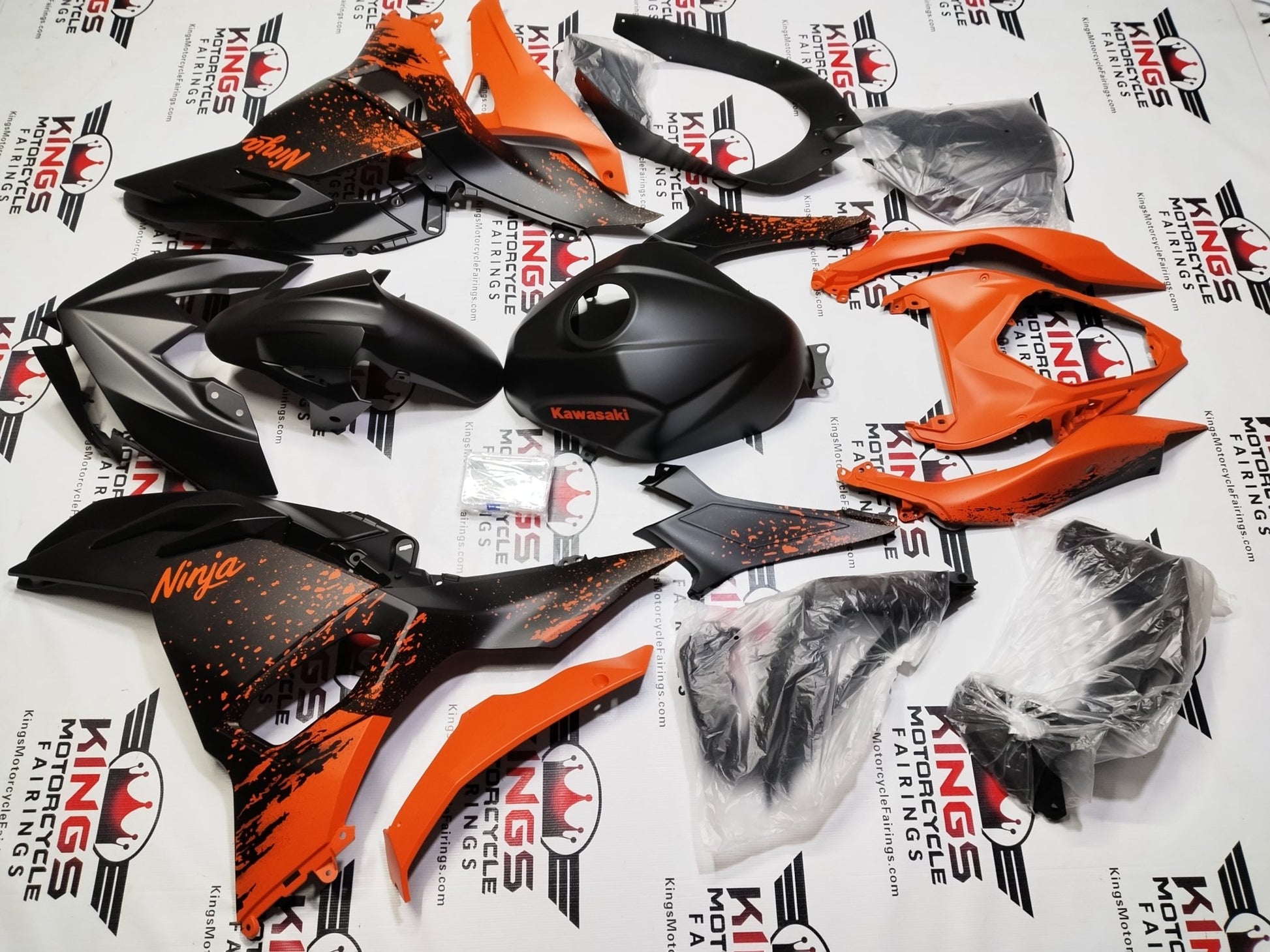 Fairings for Kawasaki Ninja 500 (2024-2025) Matte Black, Orange Spray at KingsMotorcycleFairings.com