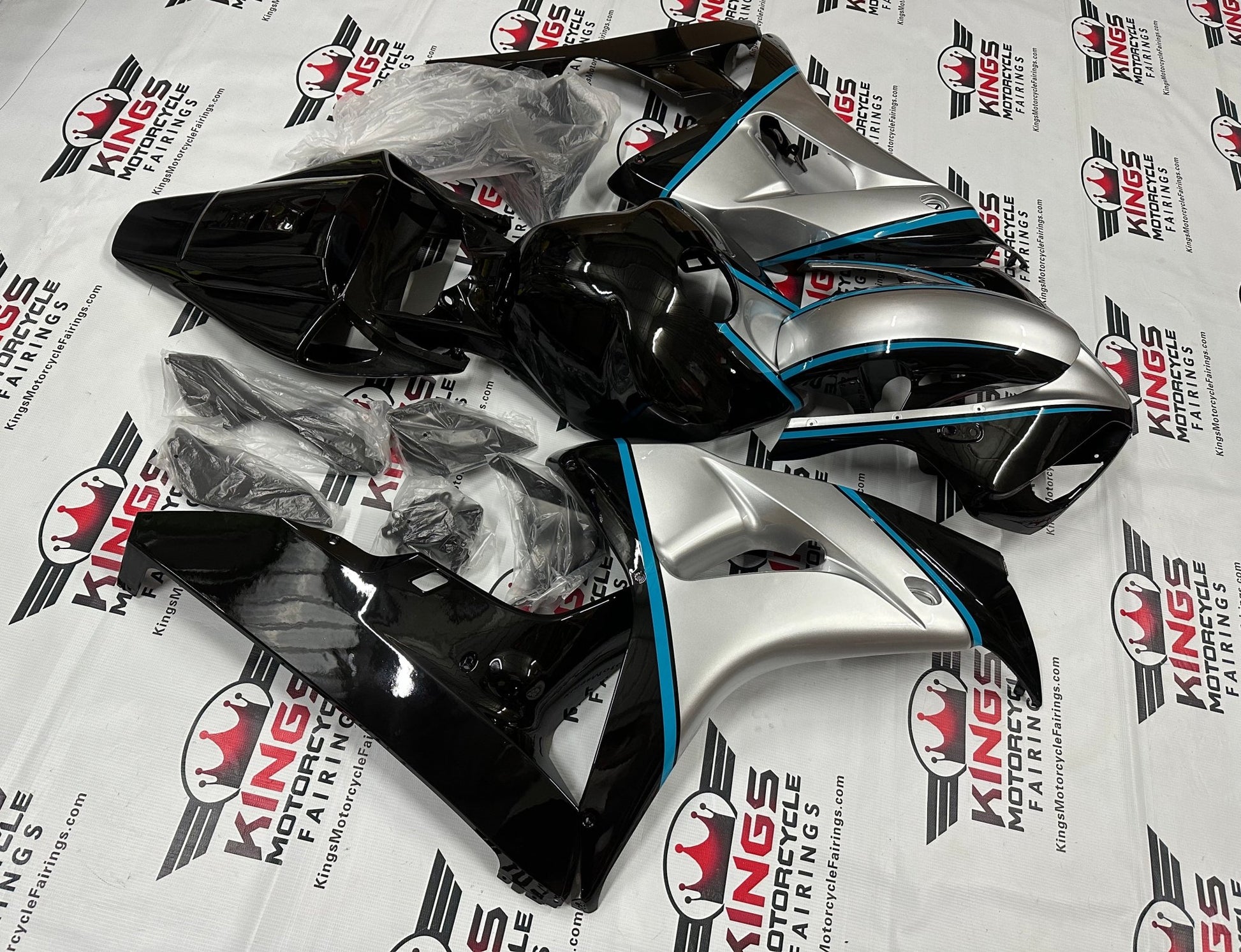 Honda CBR1000RR Fairing Kit (2006-2007) Black, Silver, Blue Pinstripe at KingsMotorcycleFairings.com