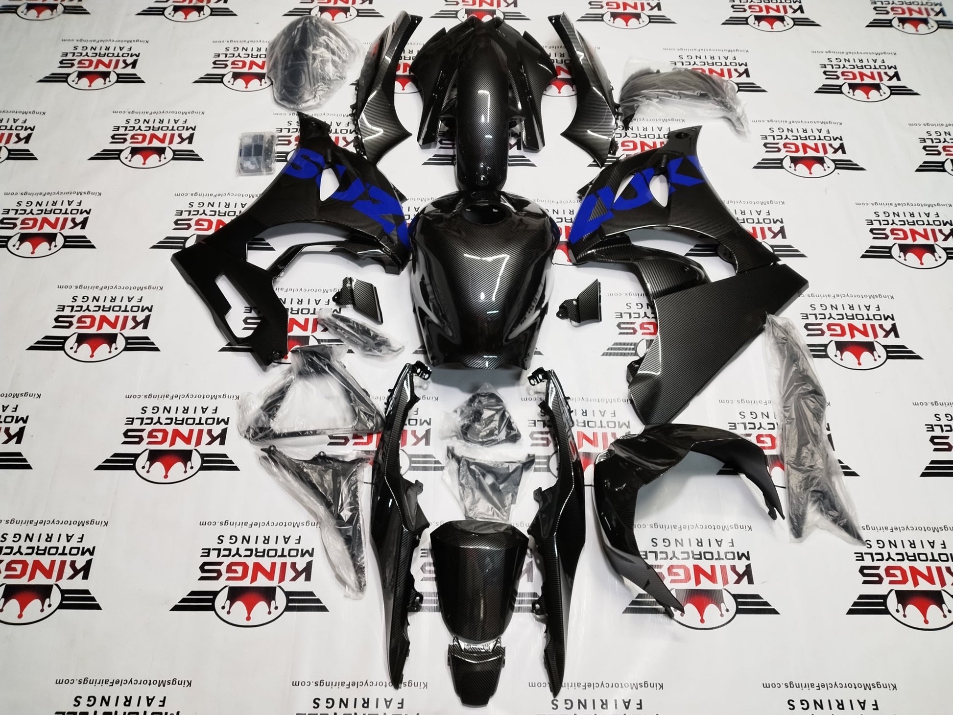 Suzuki GSXR1000 Fairings (2017-2025) Faux Carbon Fiber, Blue, Red from KingsMotorcycleFairings.com