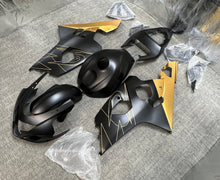 Suzuki GSXR600 Fairing Kit (2004-2005) Matte Black, Gold Tribal at KingsMotorcycleFairings.com