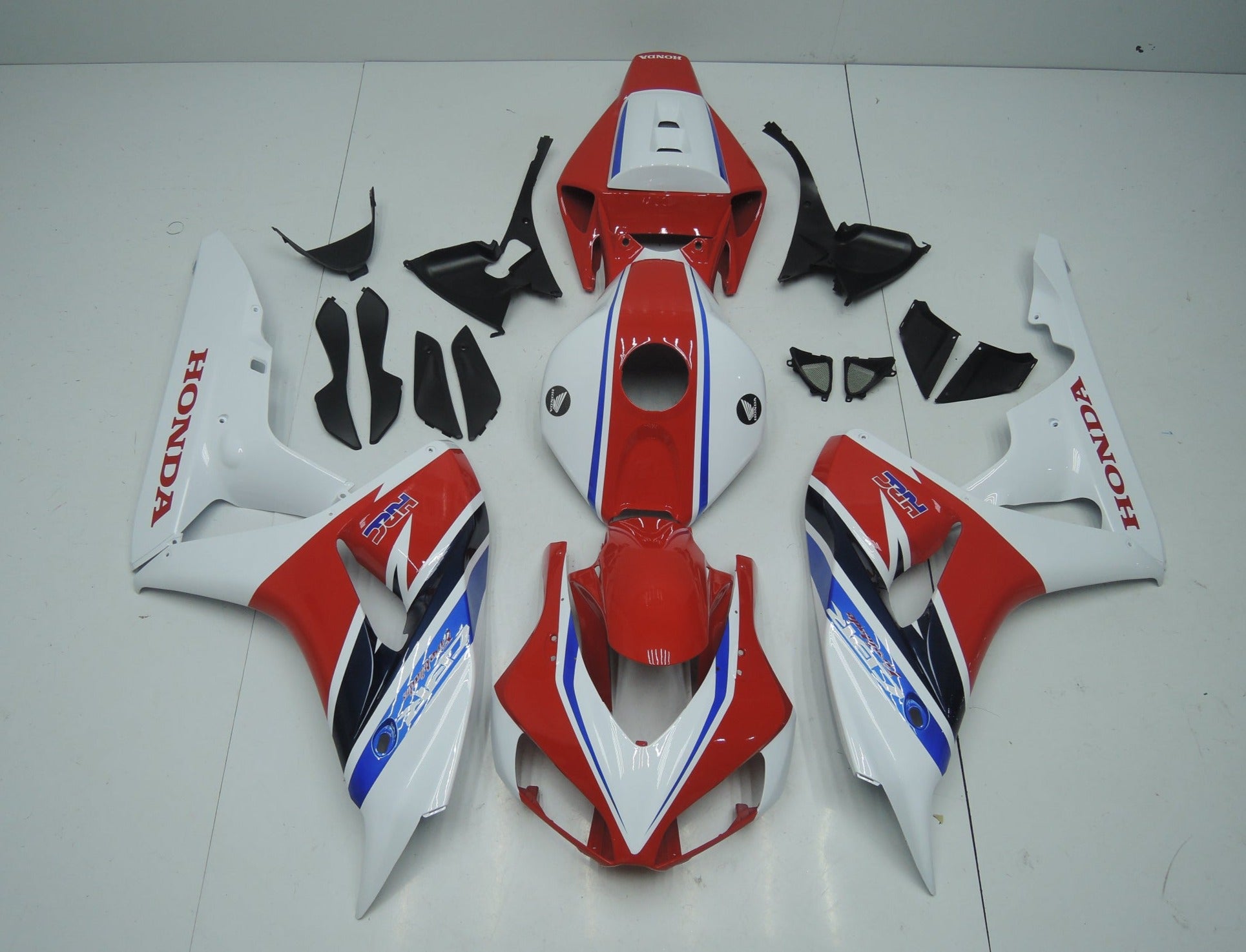 Red, White, Blue and Dark Blue HRC Fairing Kit for a 2006 & 2007 Honda CBR1000RR motorcycle.