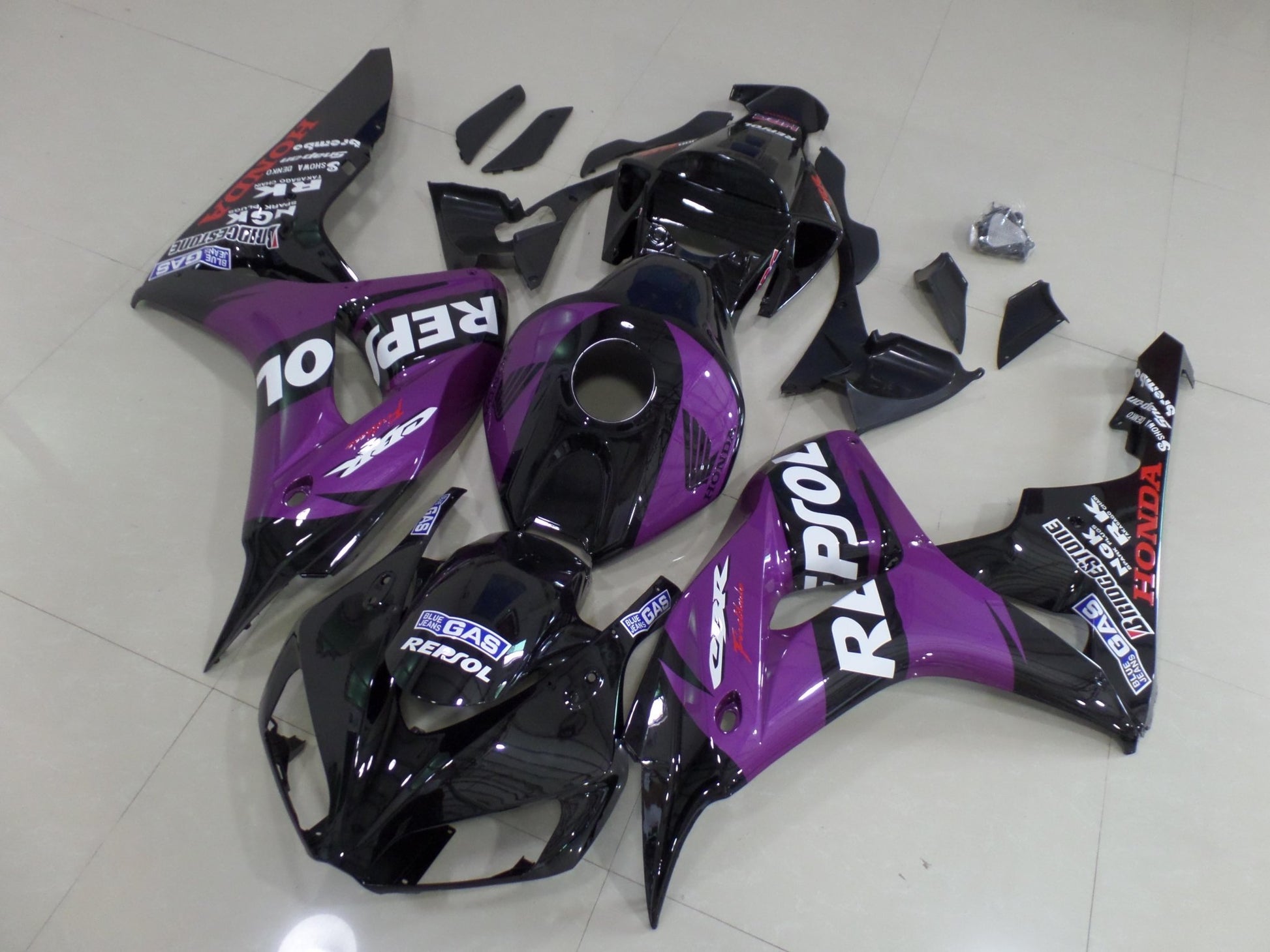 Black, Purple and White Repsol Fairing Kit for a 2006 & 2007 Honda CBR1000RR motorcycle