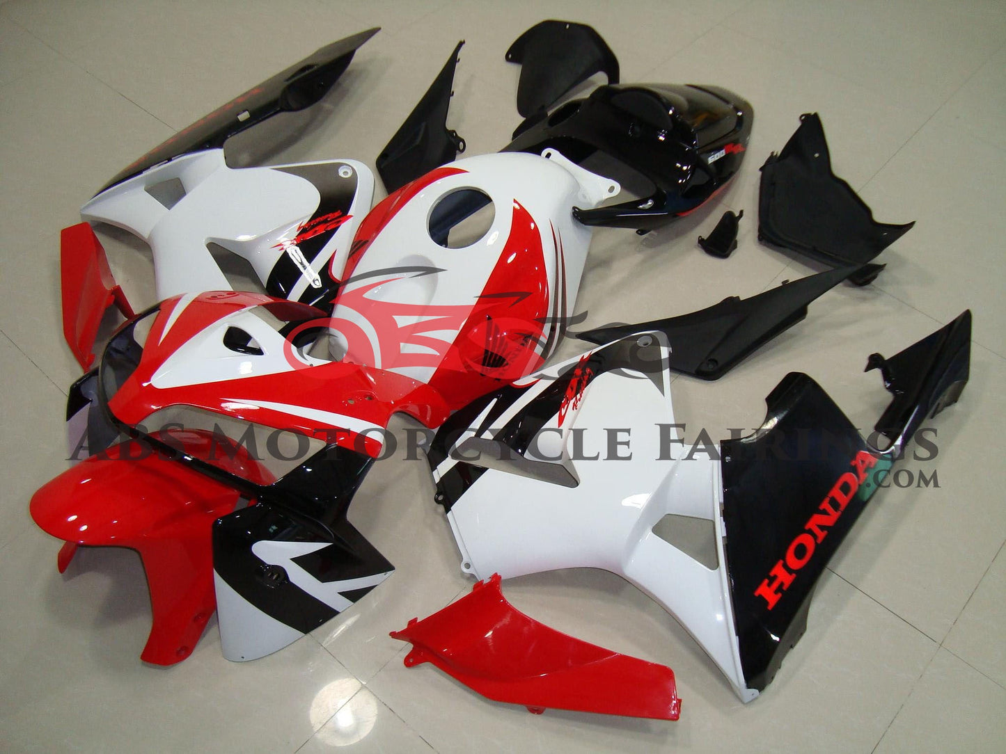 White, Red and Black Fairing Kit for a 2005, 2006 Honda CBR600RR motorcycle.
