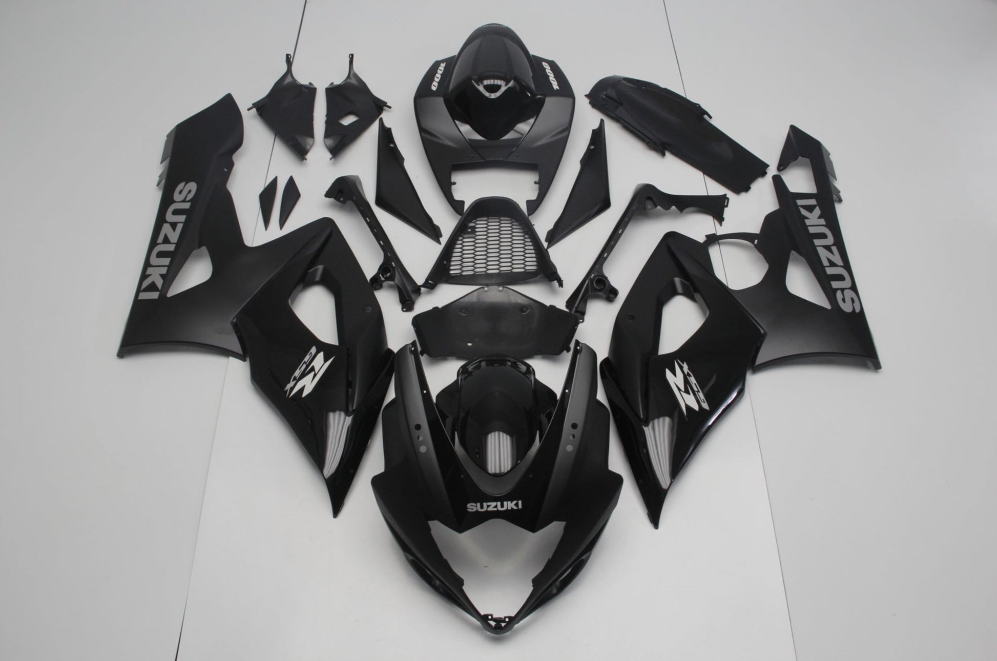 Matte Black, Gloss Black and Silver Fairing Kit for a 2005 & 2006 Suzuki GSX-R1000 motorcycle