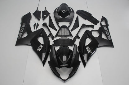 Matte Black, Gloss Black and Silver Fairing Kit for a 2005 & 2006 Suzuki GSX-R1000 motorcycle