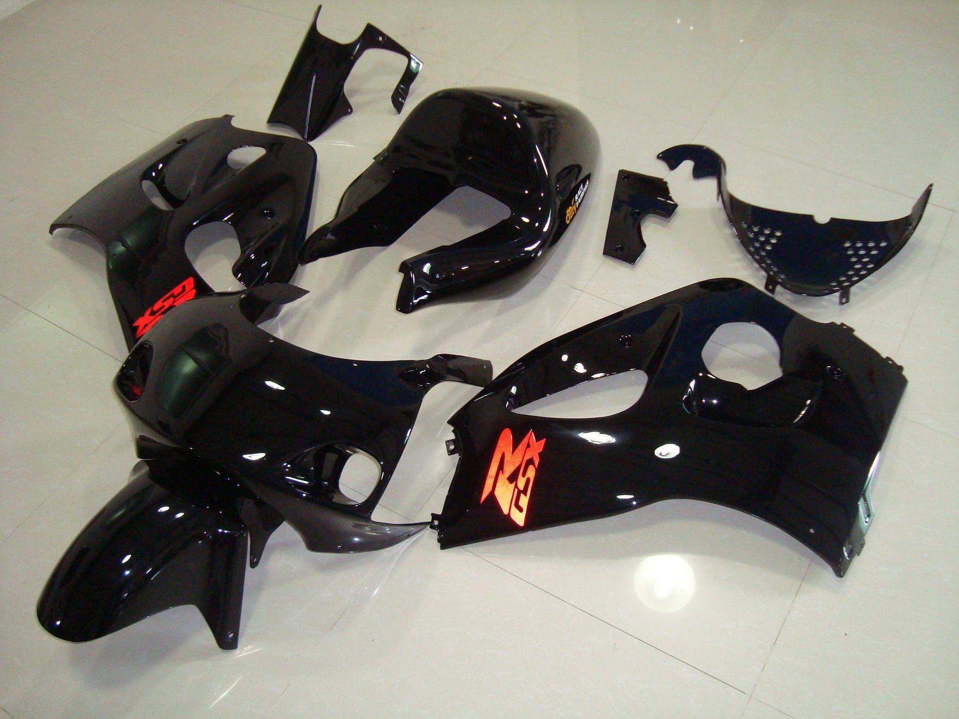 Suzuki GSXR600 Fairings (1996-1999) Black, Red Racetrack Fairings at KingsMotorcycleFairings.com