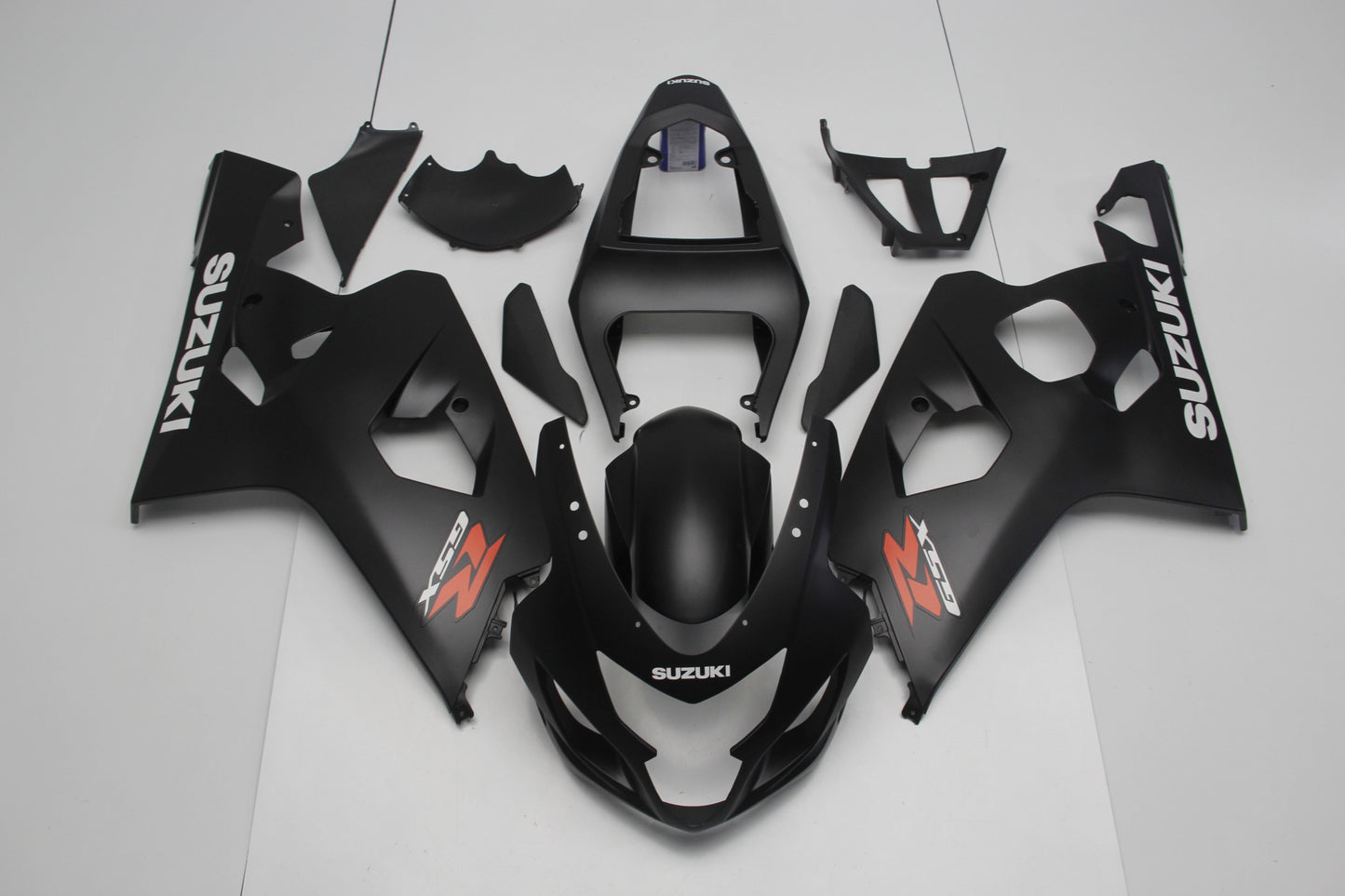 Matte Black, White and Red Fairing Kit for a 2004 & 2005 Suzuki GSX-R750 motorcycle