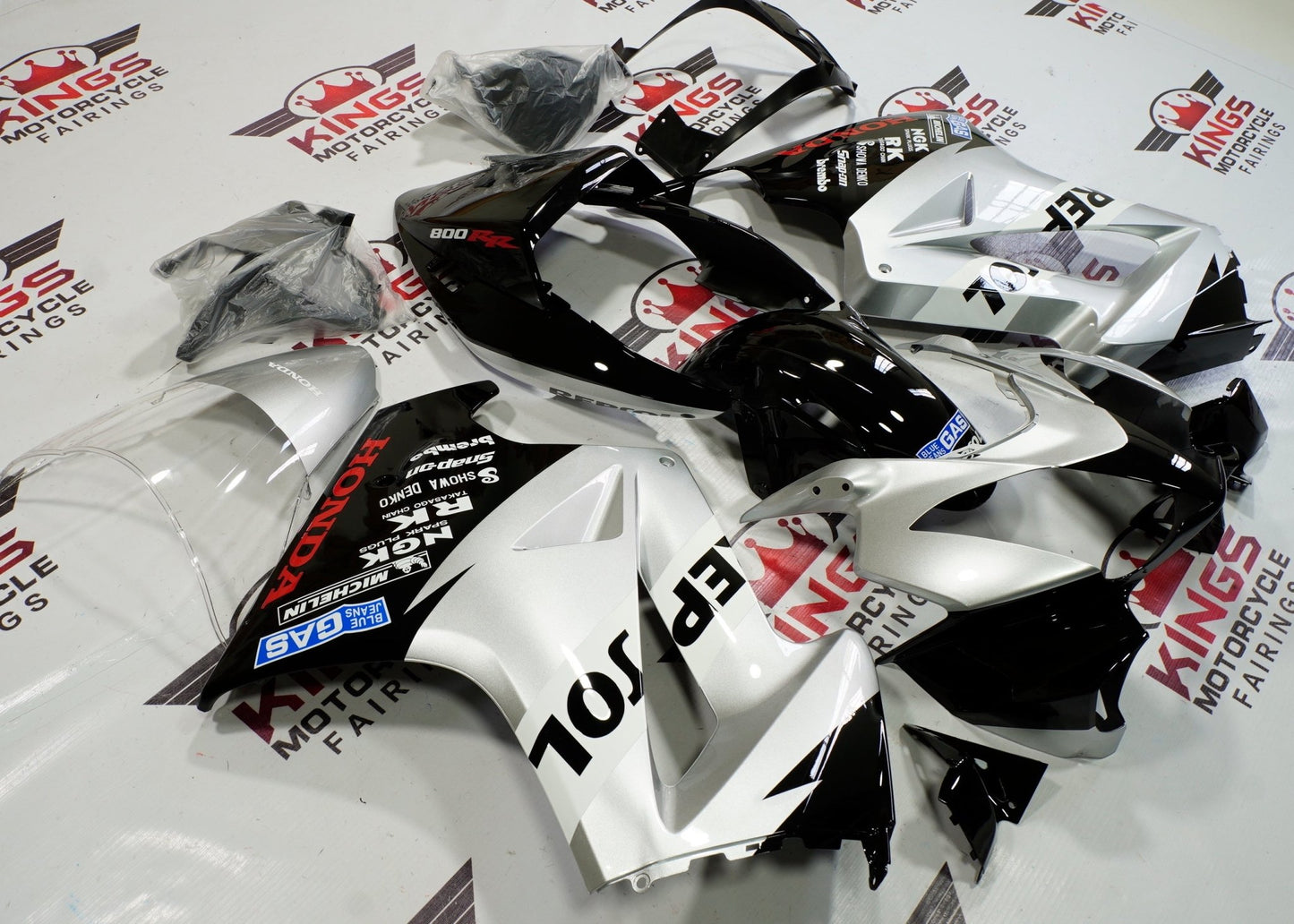 Honda VFR800 Fairings (2002-2013) Silver, Black Repsol from KingsMotorcycleFairings.com