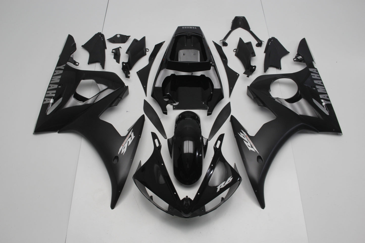Gloss Black, Matte Black and Silver Fairing Kit for a 2005 Yamaha YZF-R6 motorcycle.