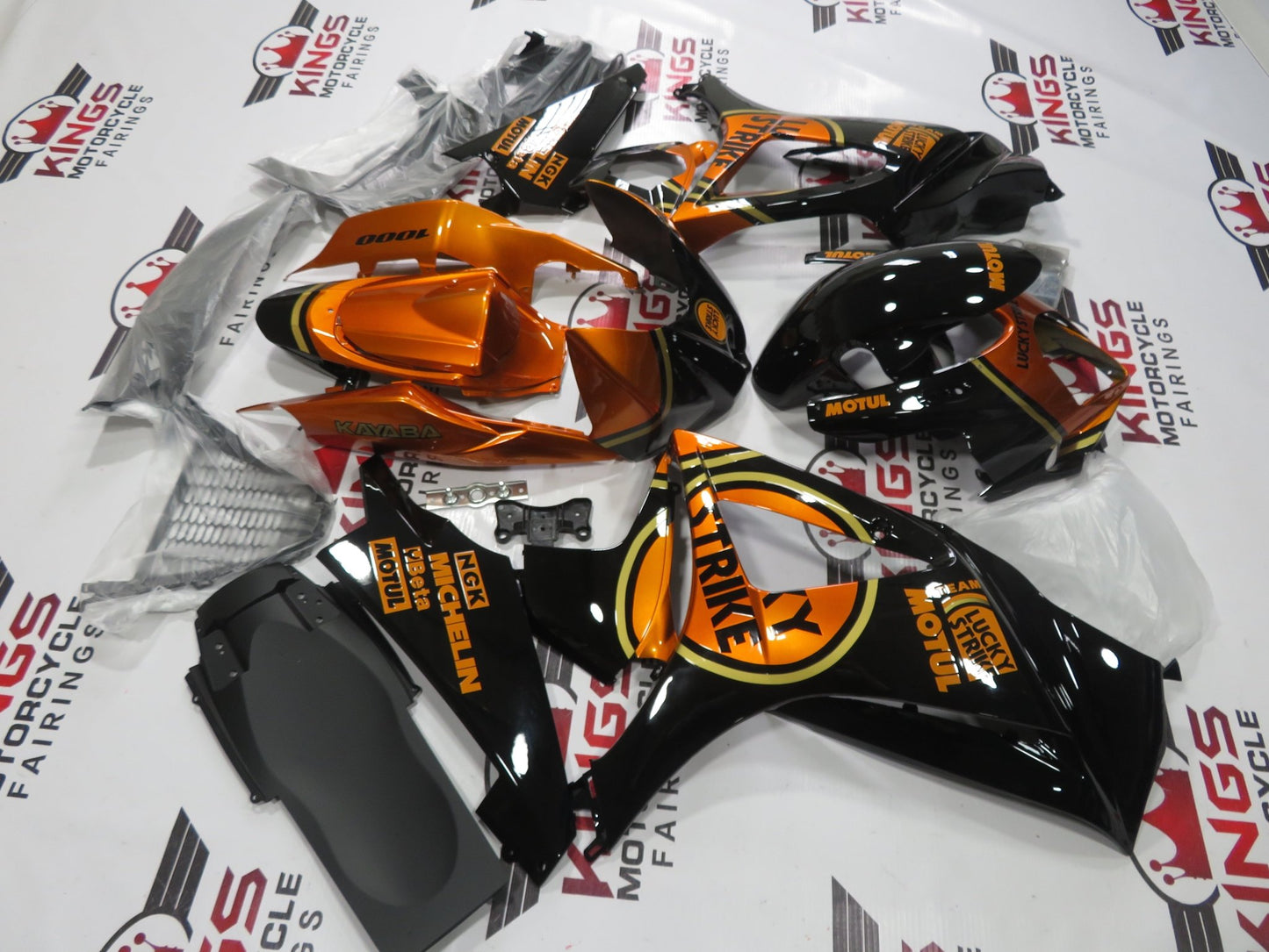 Black, Copper and Gold Fairing Kit for a 2003 & 2004 Suzuki GSX-R1000 motorcycle